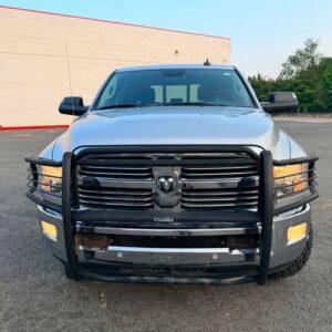 Silver Ram pickup truck front with grille guard